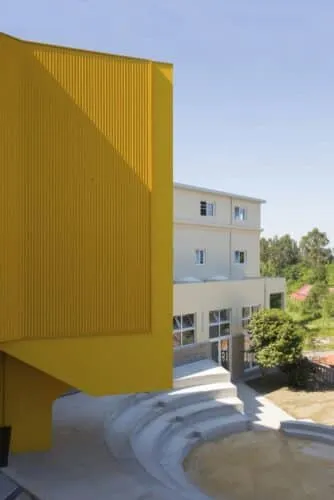 Edificio amarillo. Aurora Arquitectos. Escuela de música Artave/CCM