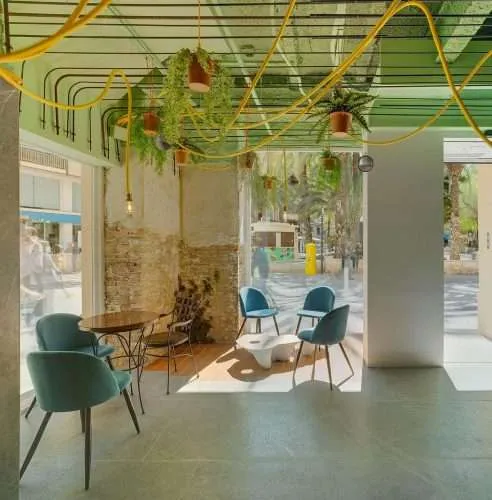 Boutique de Café. World of Holistic Architecture. minimalismo colorido