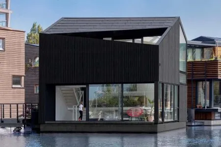 Casa flotante. Comunidad sostenible. i29 Architects
