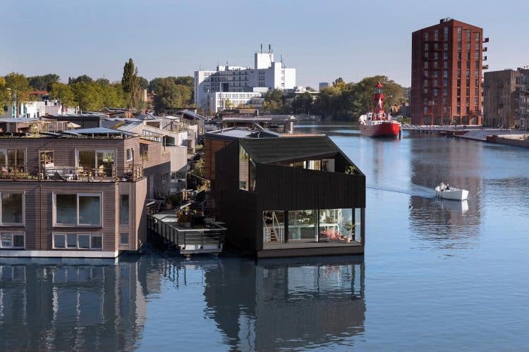 Casa flotante. Comunidad sostenible. i29 Architects